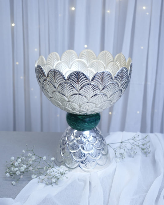 A decorative silver Plated metal bowl
